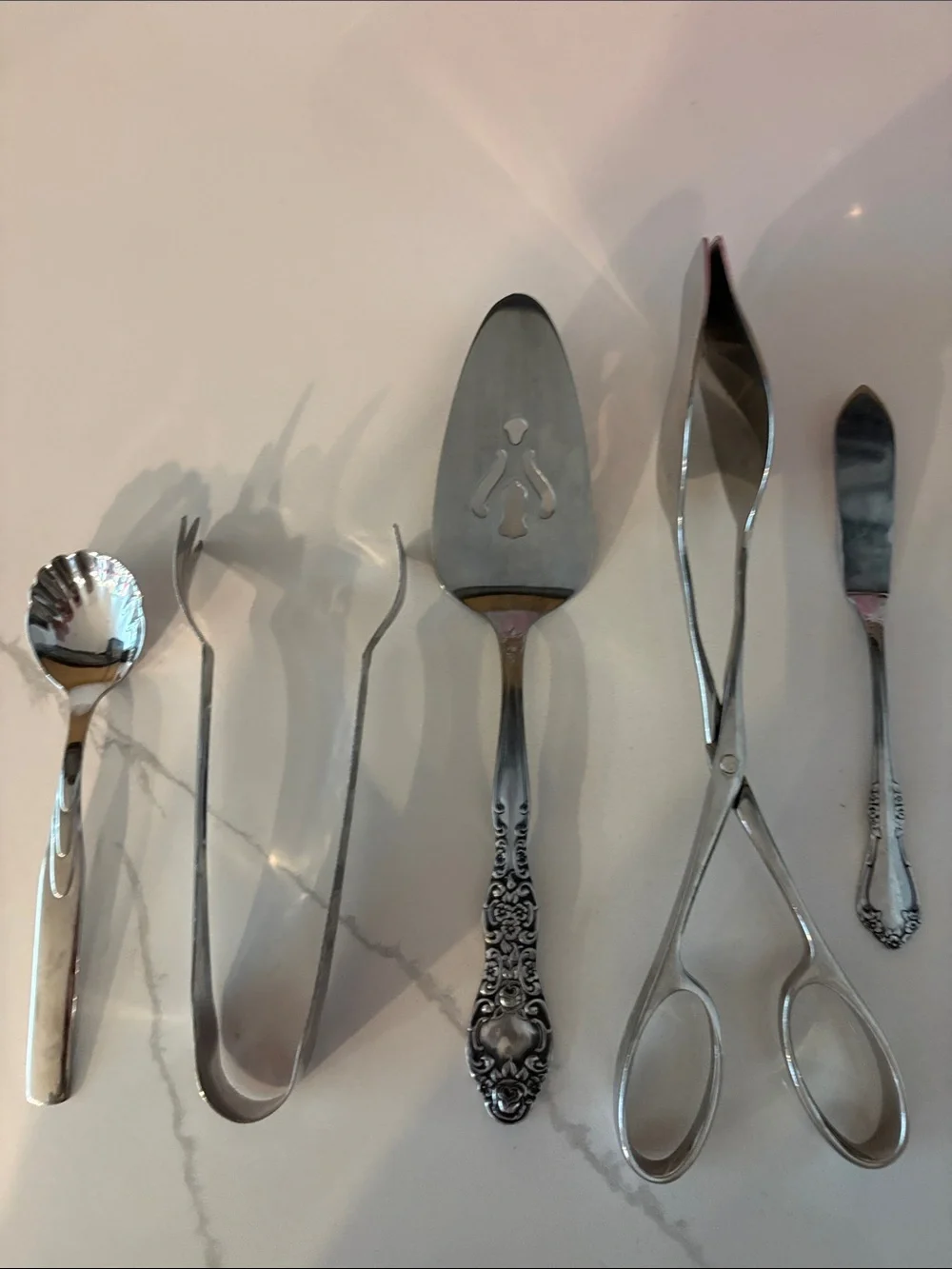 Group of five Silver toned serving pieces